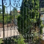 Arco di fiori in ferro battuto